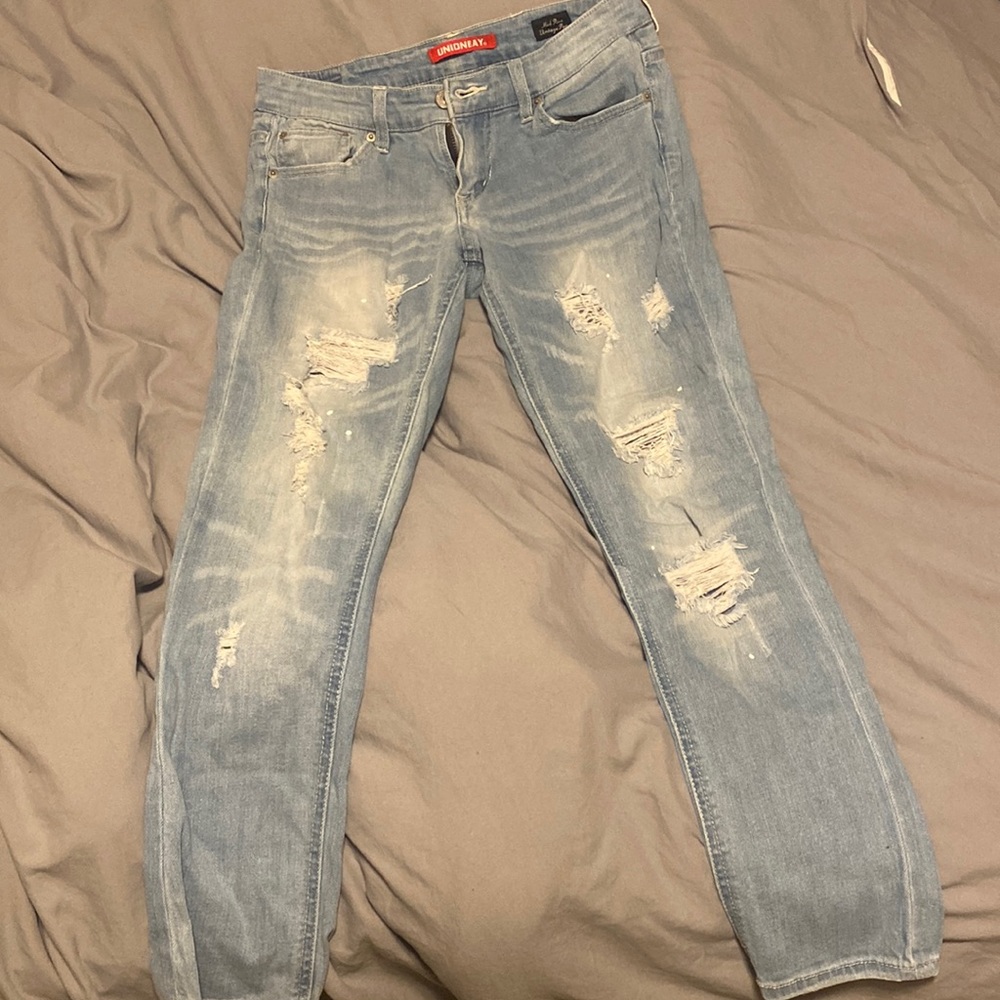 Straight leg, paint splatter ripped jeans.